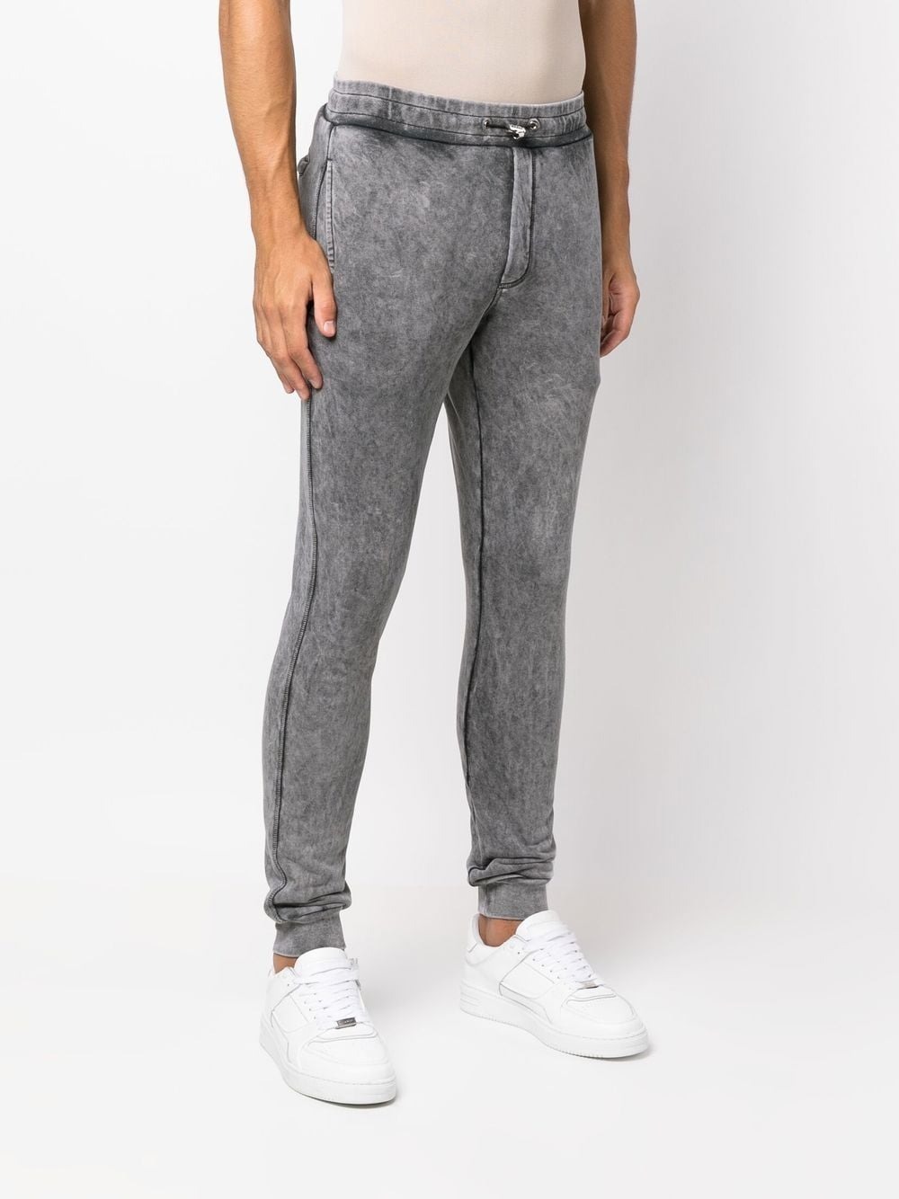 Buy Pants Philipp Plein logo-patch bleached track pants (FABC