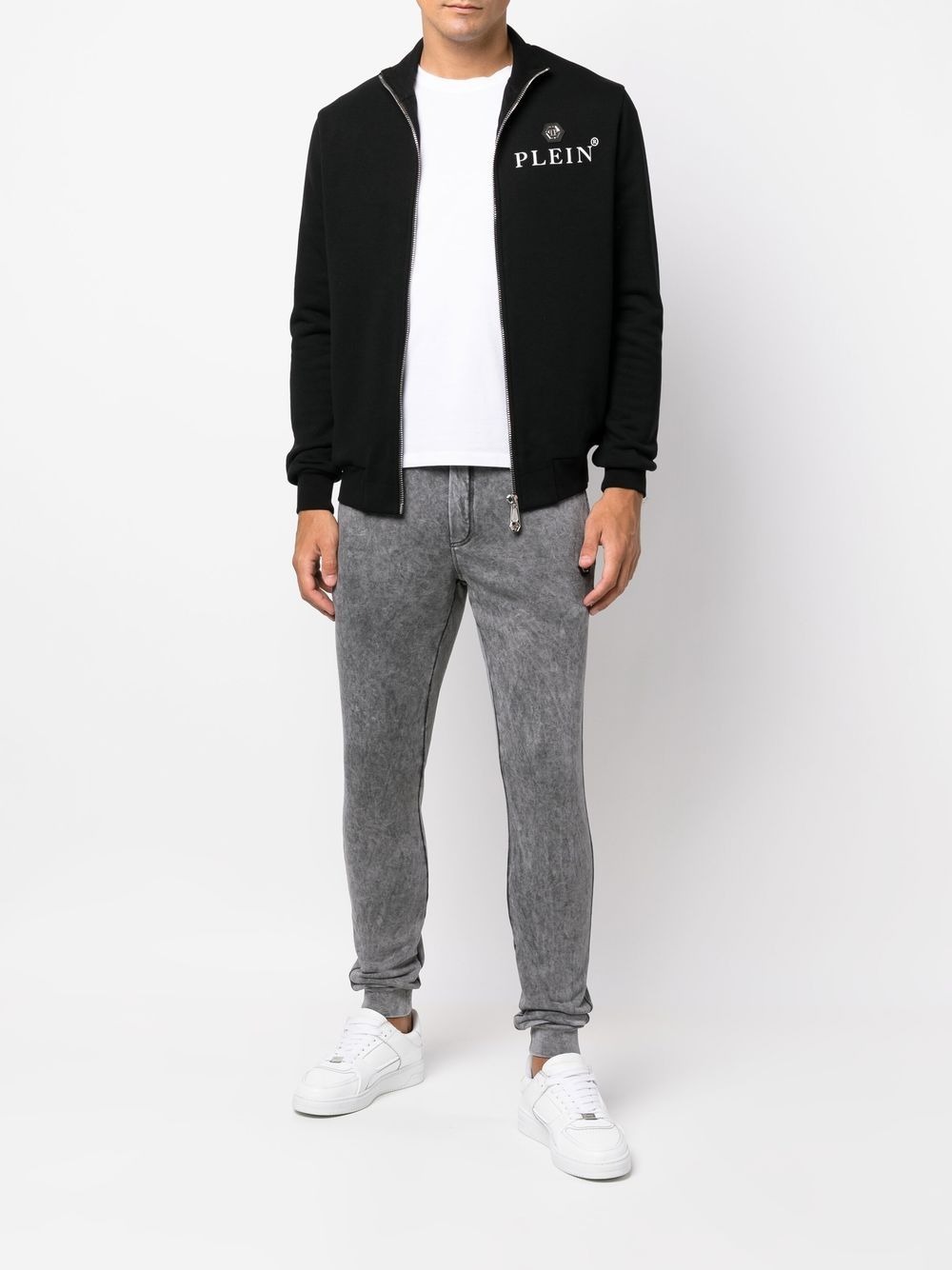 Buy Pants Philipp Plein logo-patch bleached track pants (FABC