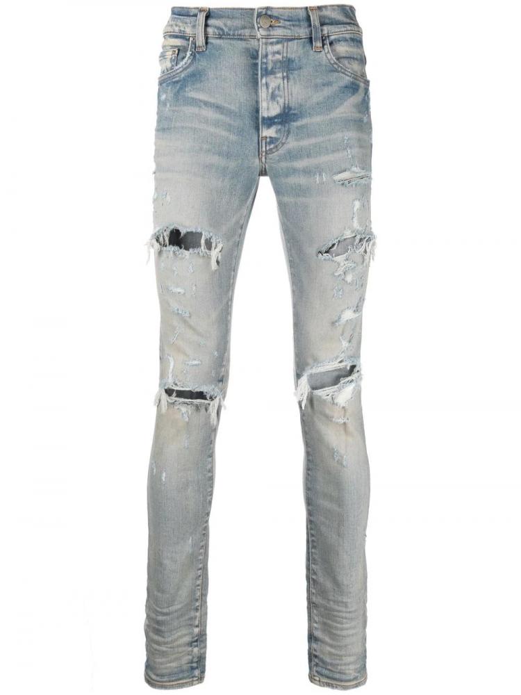 Amiri - distressed skinny jeans