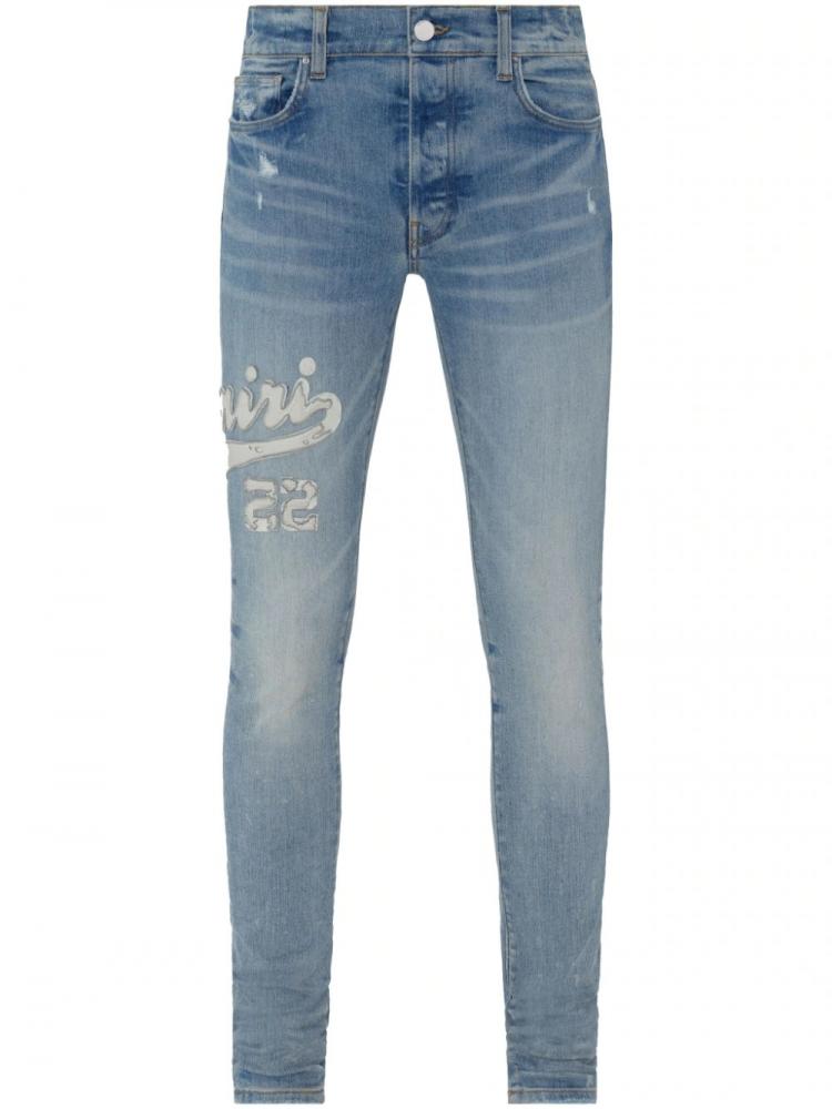 Amiri - Varsity logo appliquè skinny jeans