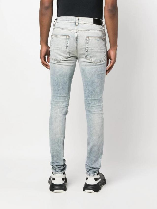 Amiri - distressed slim-fit jeans
