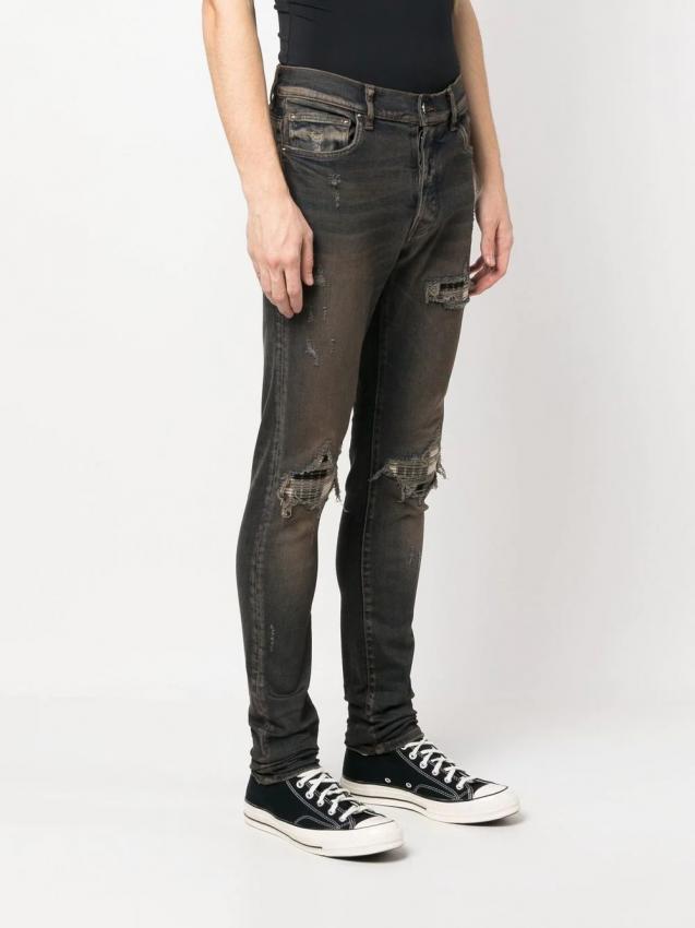 Amiri - distressed-effect slim-fit jeans