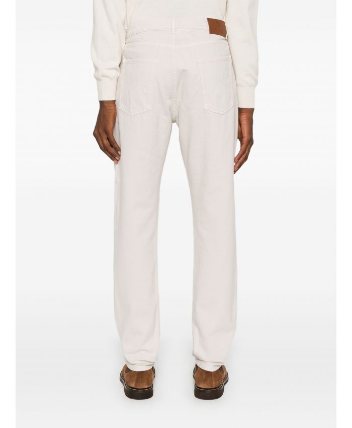 Brunello Cucinelli - logo-embroidered jeans