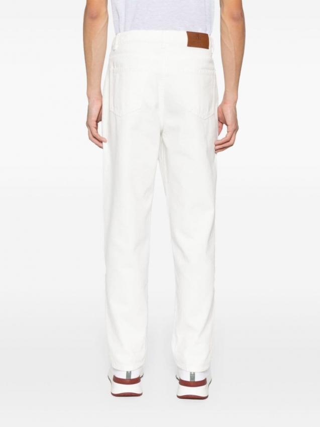 Brunello Cucinelli - logo-embroidered tapered cotton jeans